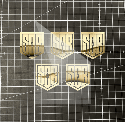 Sons of Battery - E-MTB Brand & Community Folien Innen / Gold (spiegelnd) / 3,7 cm x 3 cm 5er Pack SoB "Modernes Logo" Folienplot " E-Bike-Community