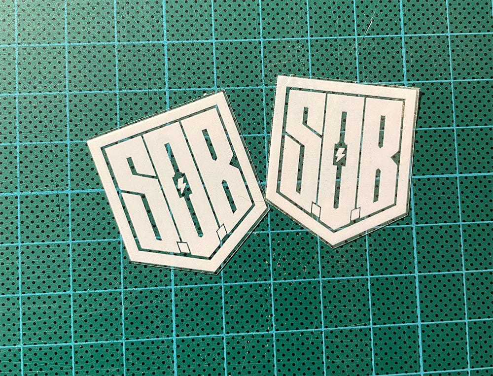 Sons of Battery - E-MTB Brand & Community Folien TRANSPARENTER SOB STICKER 3,5x3 cm - SoB - E-Bike-Community