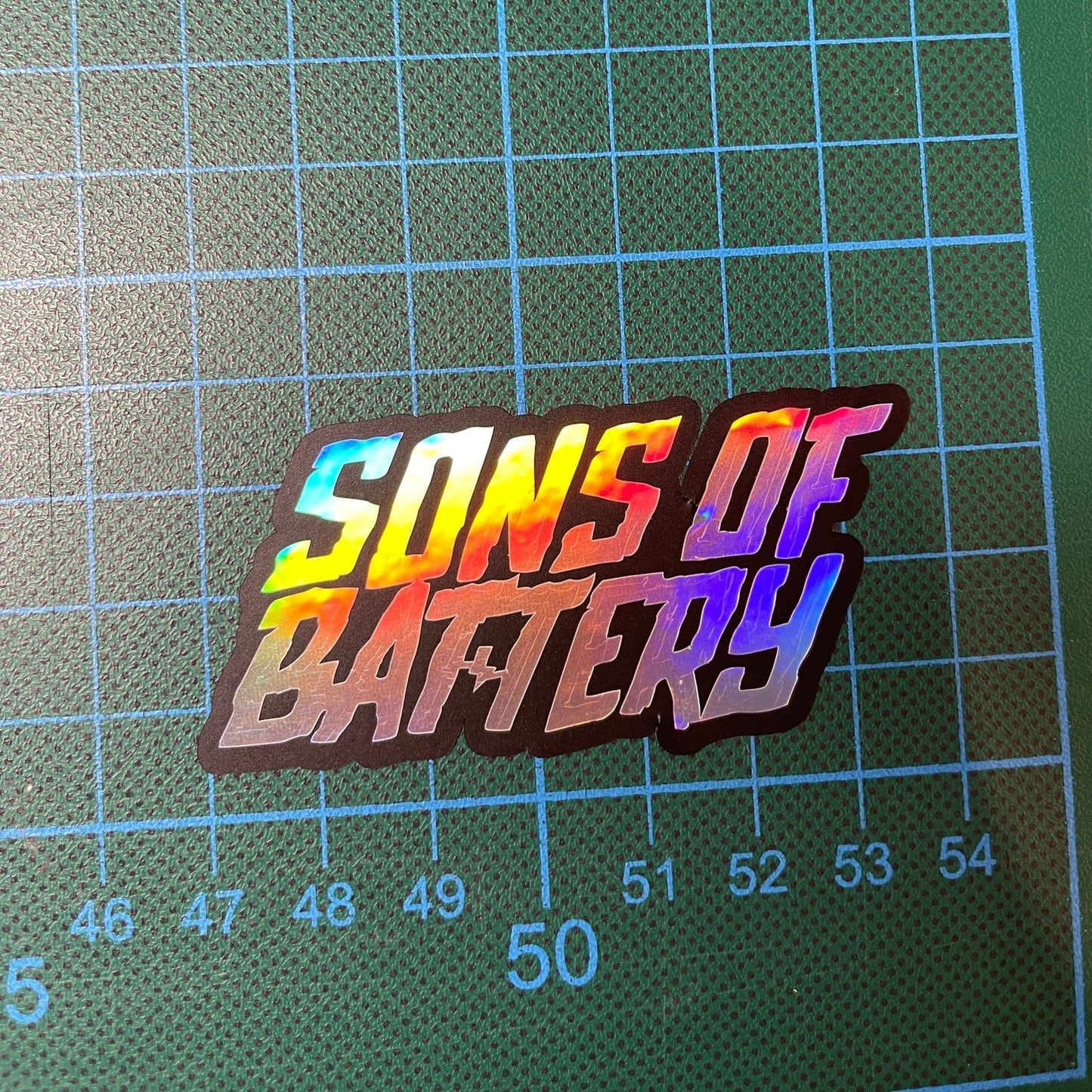 Sons of Battery® - E-MTB Brand & Community Folien und Sticker Sons of Battery Signature (6.2x4.3 cm) Holografische / Oilslick Effekt Sticker  - SoB - E-Bike-Community